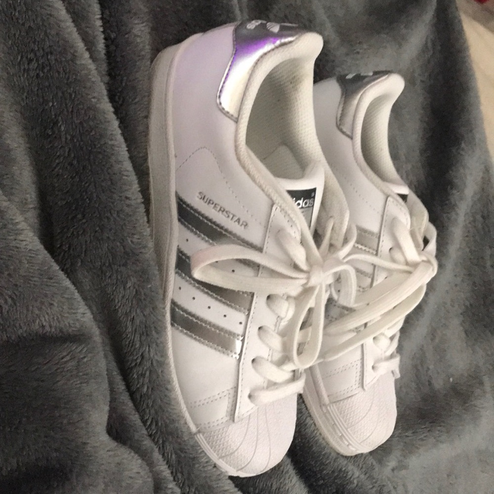 White and silver adidas shoes